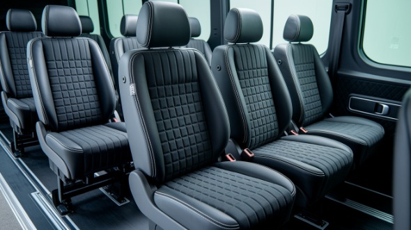 tustin sprinter van with driver inside